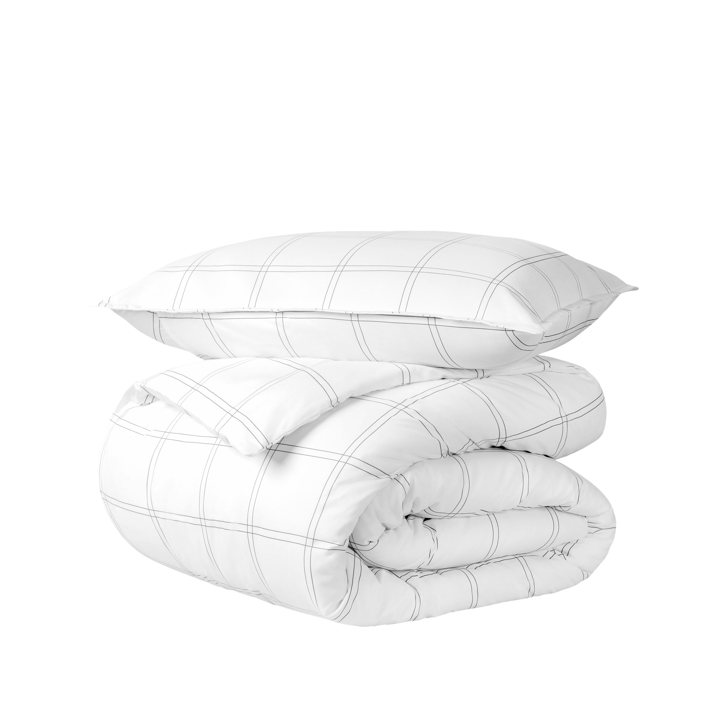 A printed comforter set folded and stacked