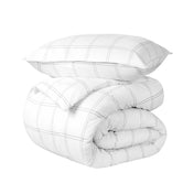 A comforter set folded and stacked