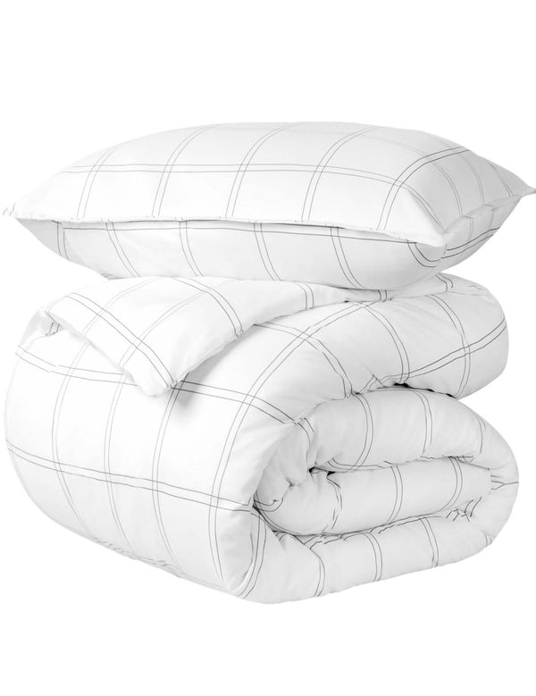 A comforter set folded and stacked