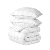 A comforter set folded and stacked