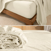 Fitted sheet on a wooden bed frame and folded fitted sheet.