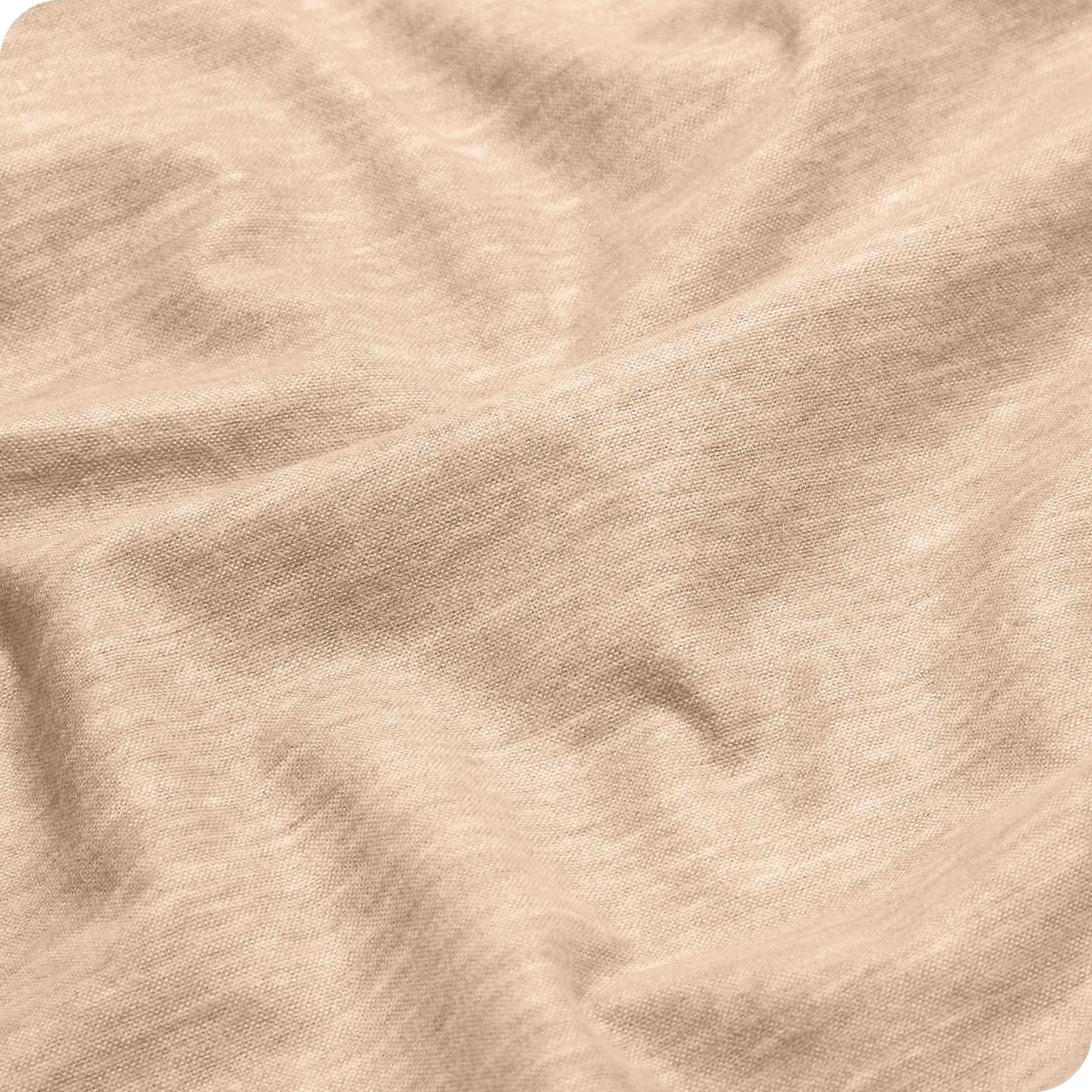 A close up view of a flannel sheet showing the texture.