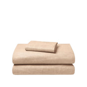 Set of flannel bed sheets on a white background