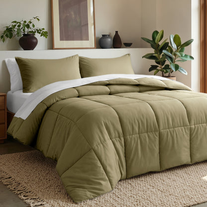Comforter set on a bed in a bedroom with plants and decor.