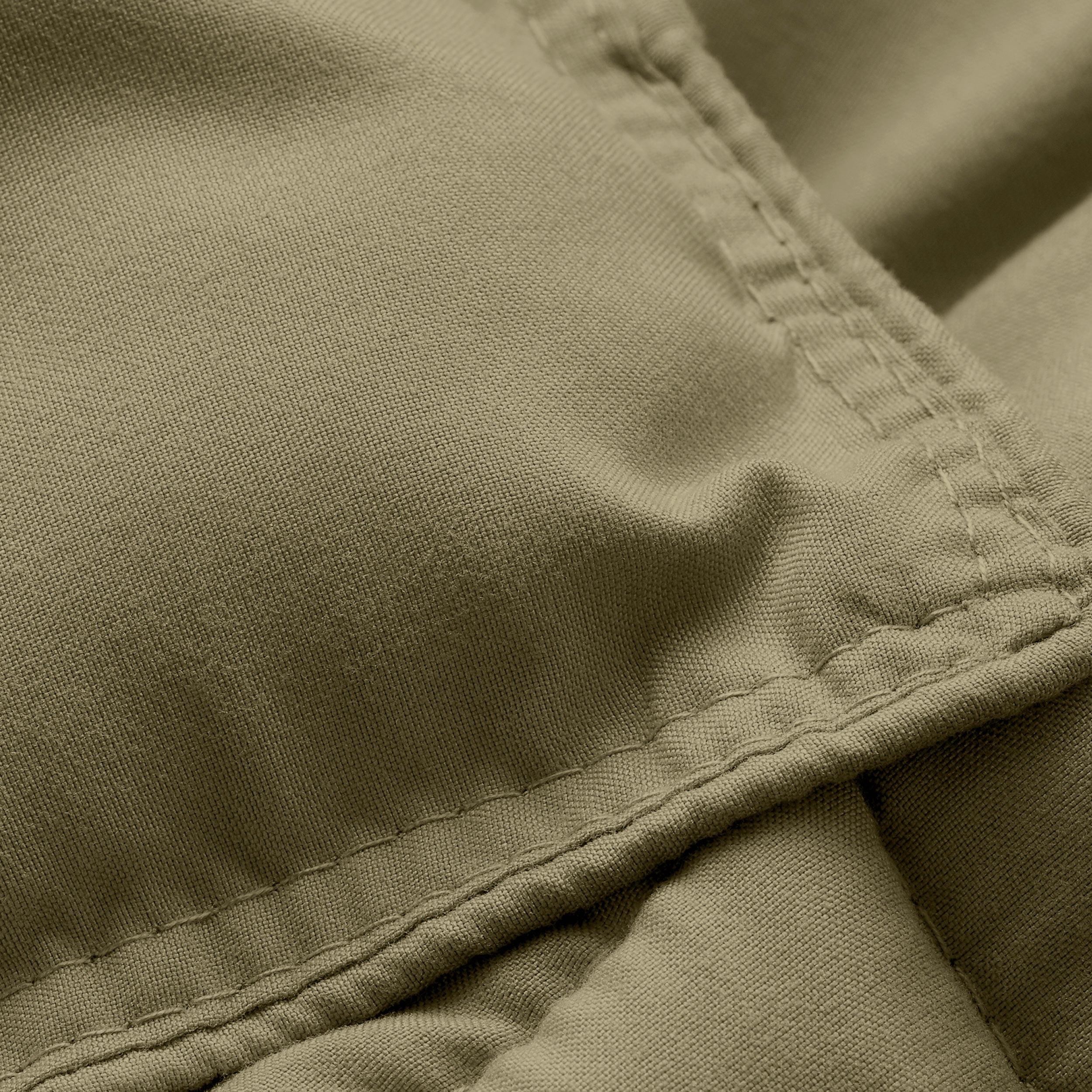 Close-up of comforter fabric with stitching detail