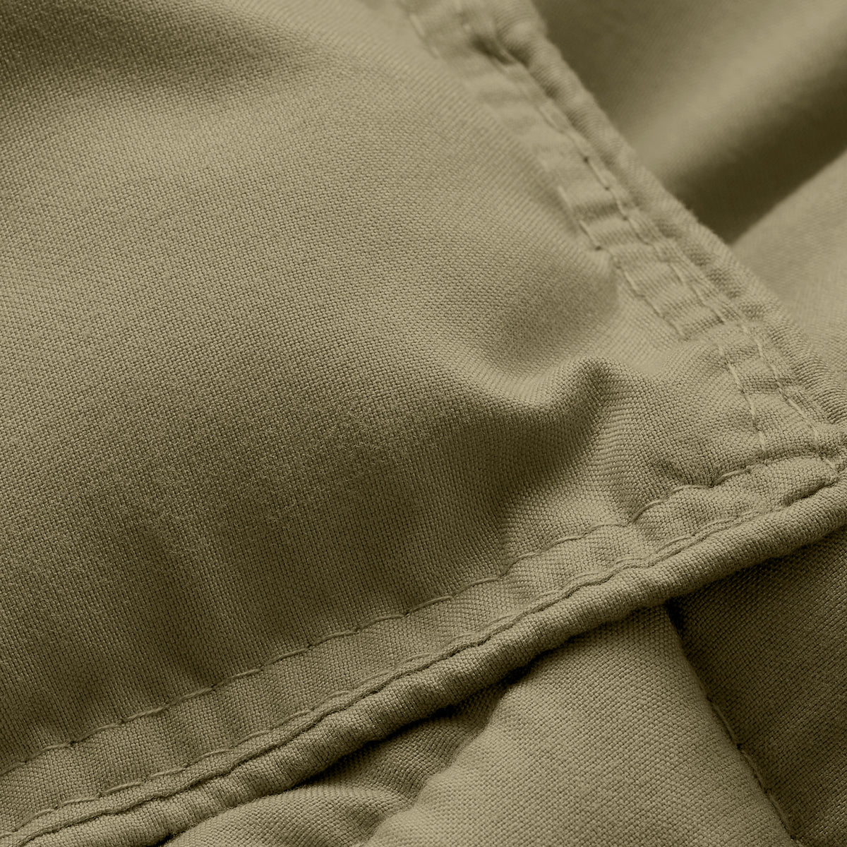 Close-up of comforter fabric with stitching detail