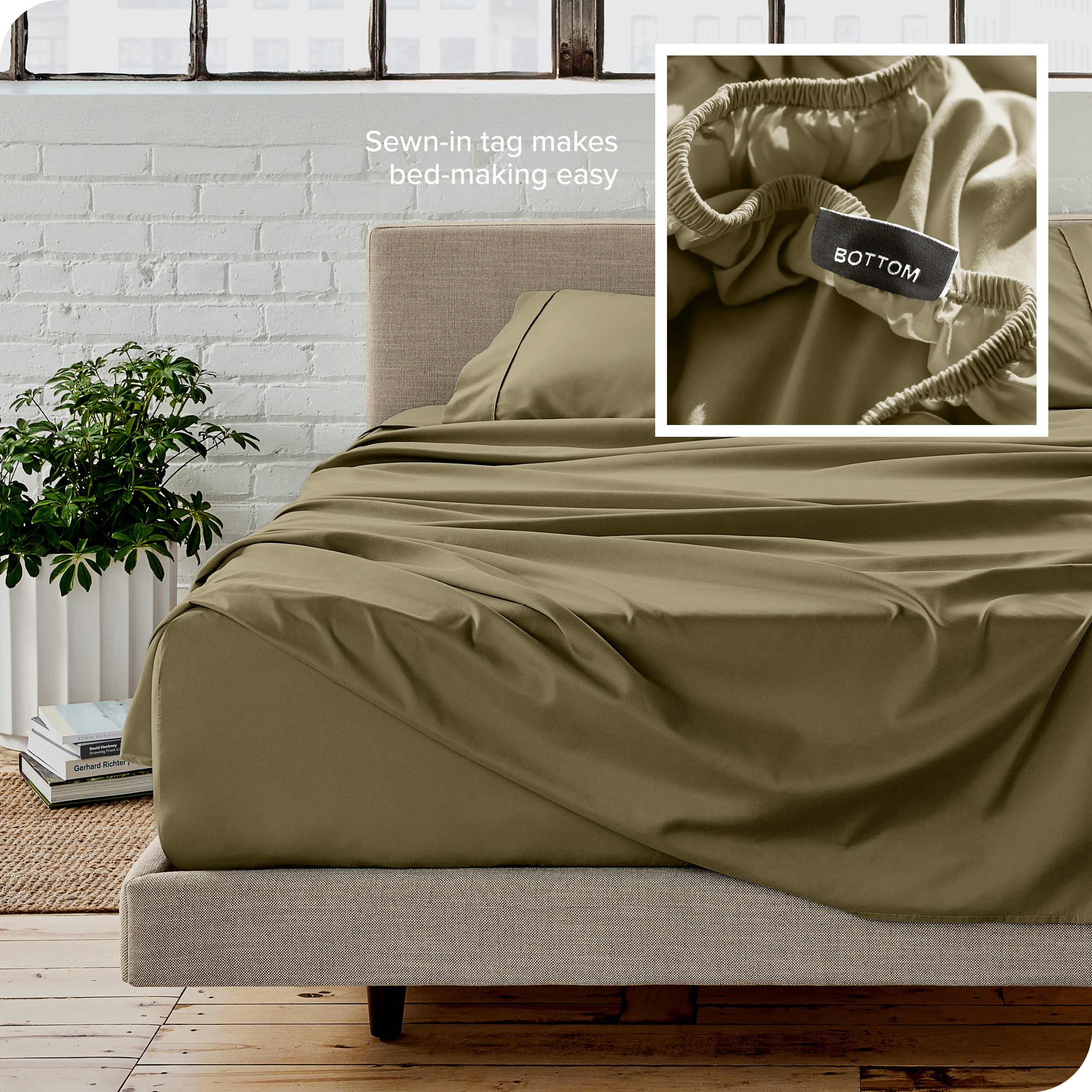 Close up of sewn in tag and matching sheets on a bed