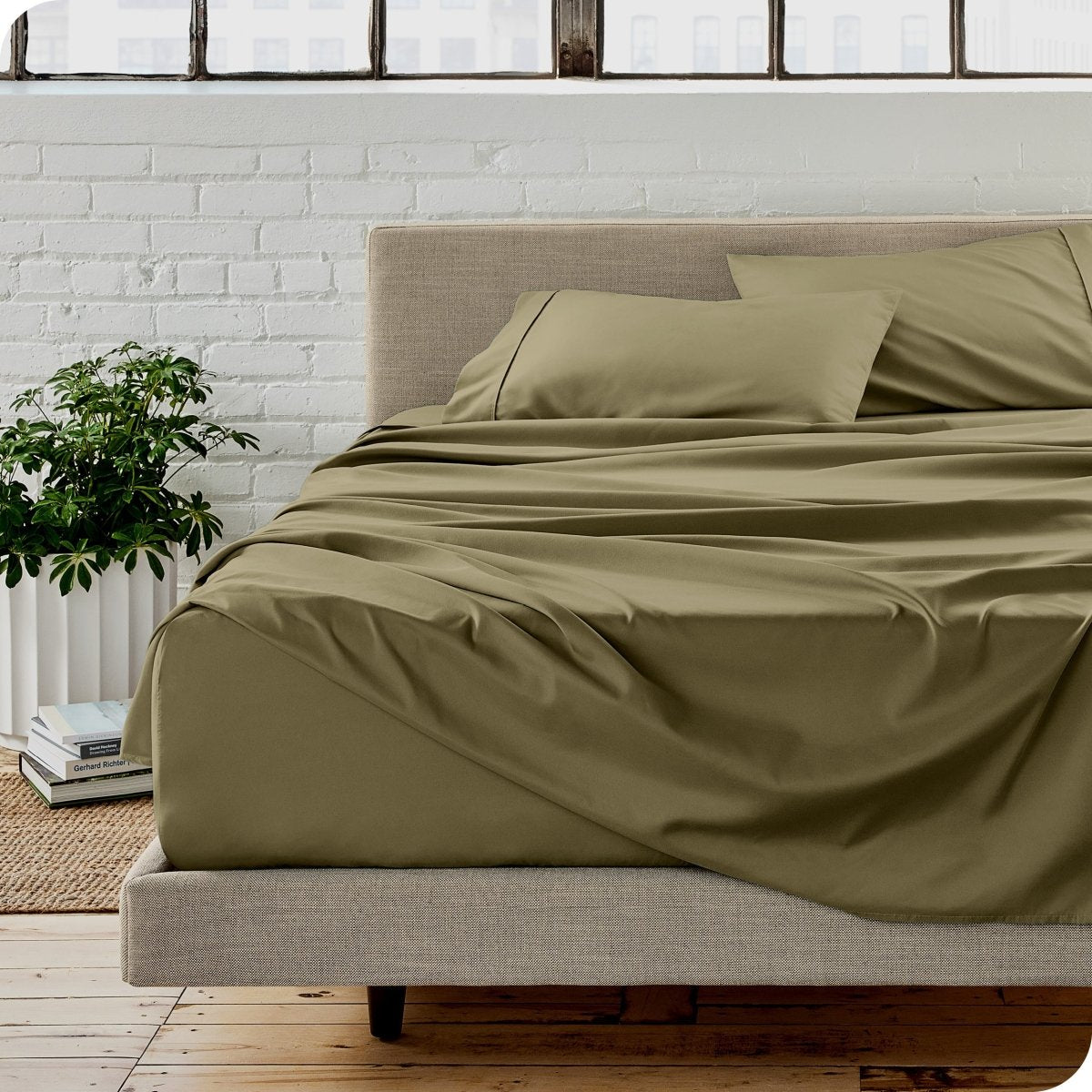 A modern bedroom with microfiber sheets on the mattress