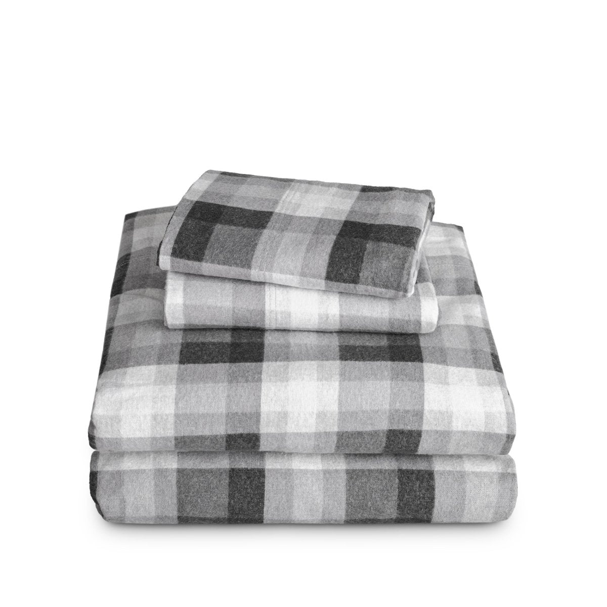 Stack of flannel sheets and pillowcases on a white background