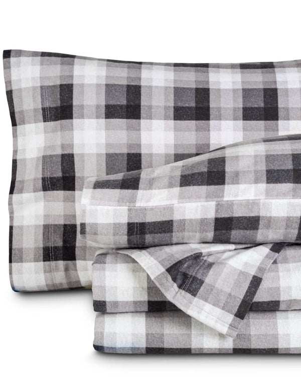 Plaid flannel sheets folded and stacked
