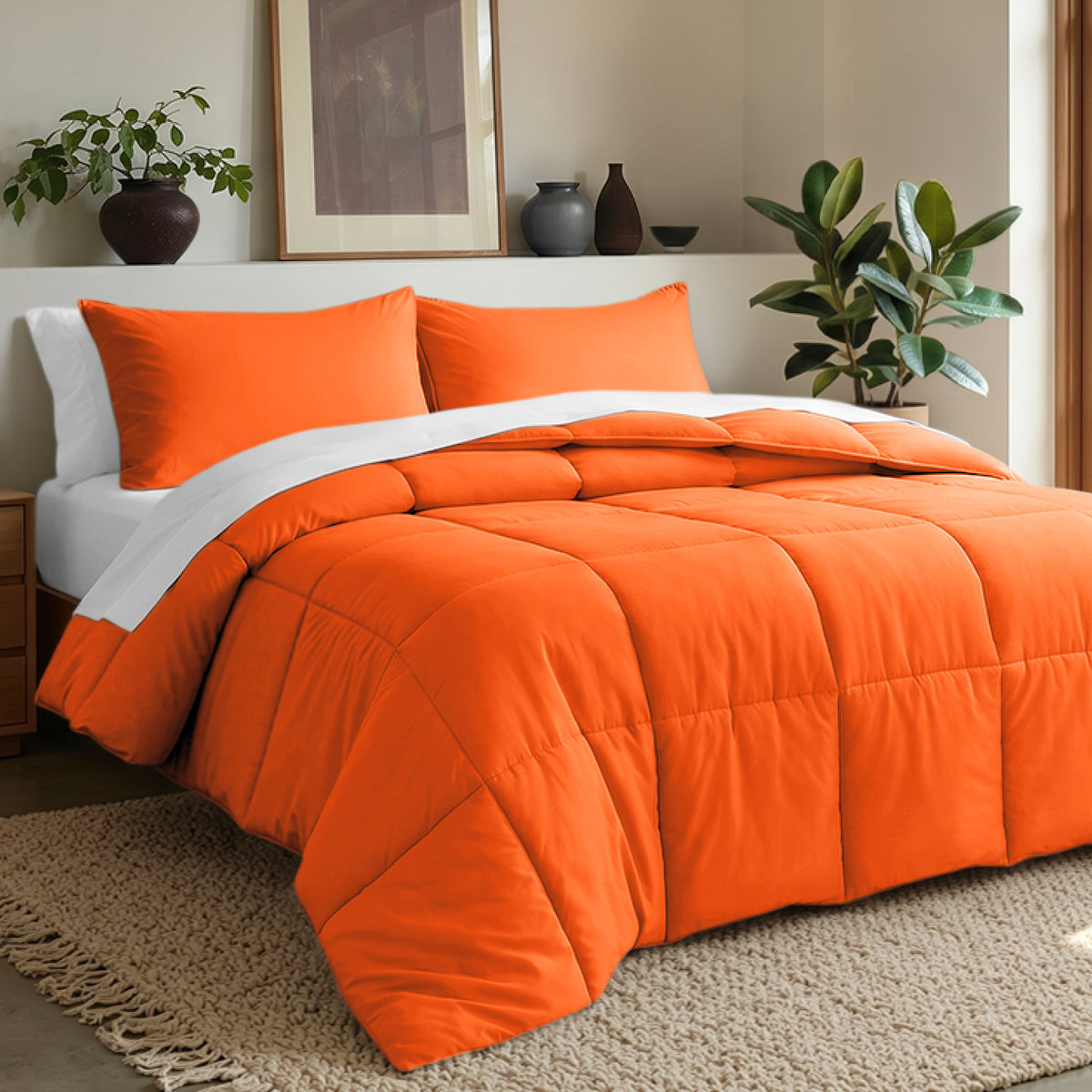 Comforter set on a bed in a bedroom with plants and decor.