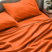 Close up of a microfiber sheet set on a bed