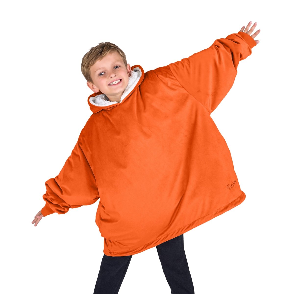 A child with a sherpa wearable blanket on