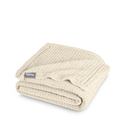 A cotton waffle blanket folded