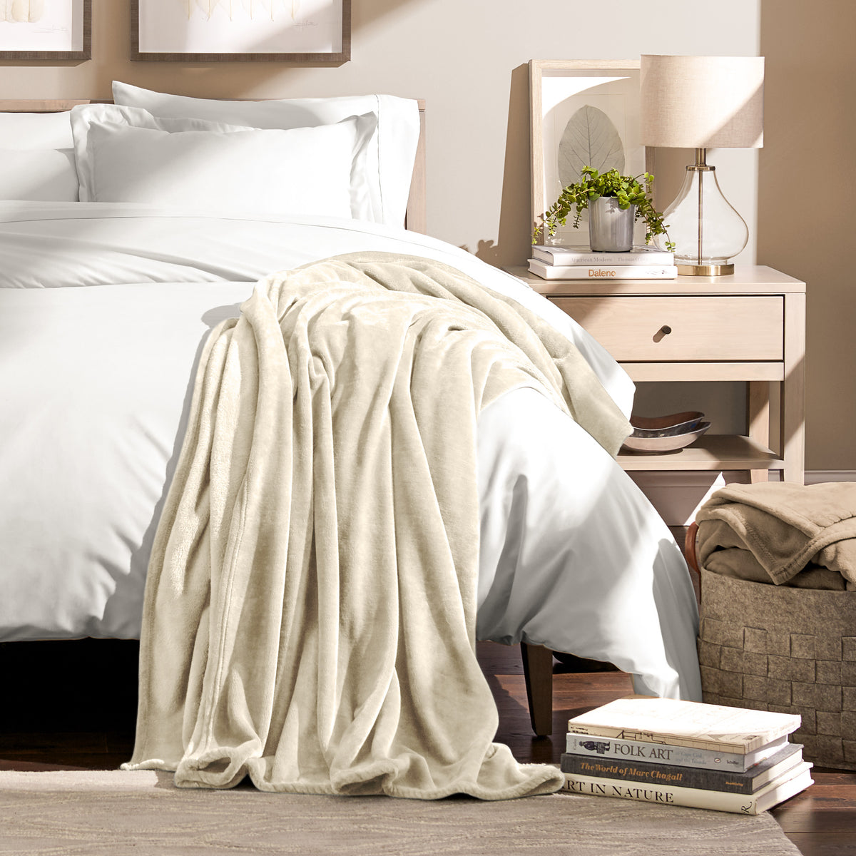 Microplush blanket draped over the corner of a bed