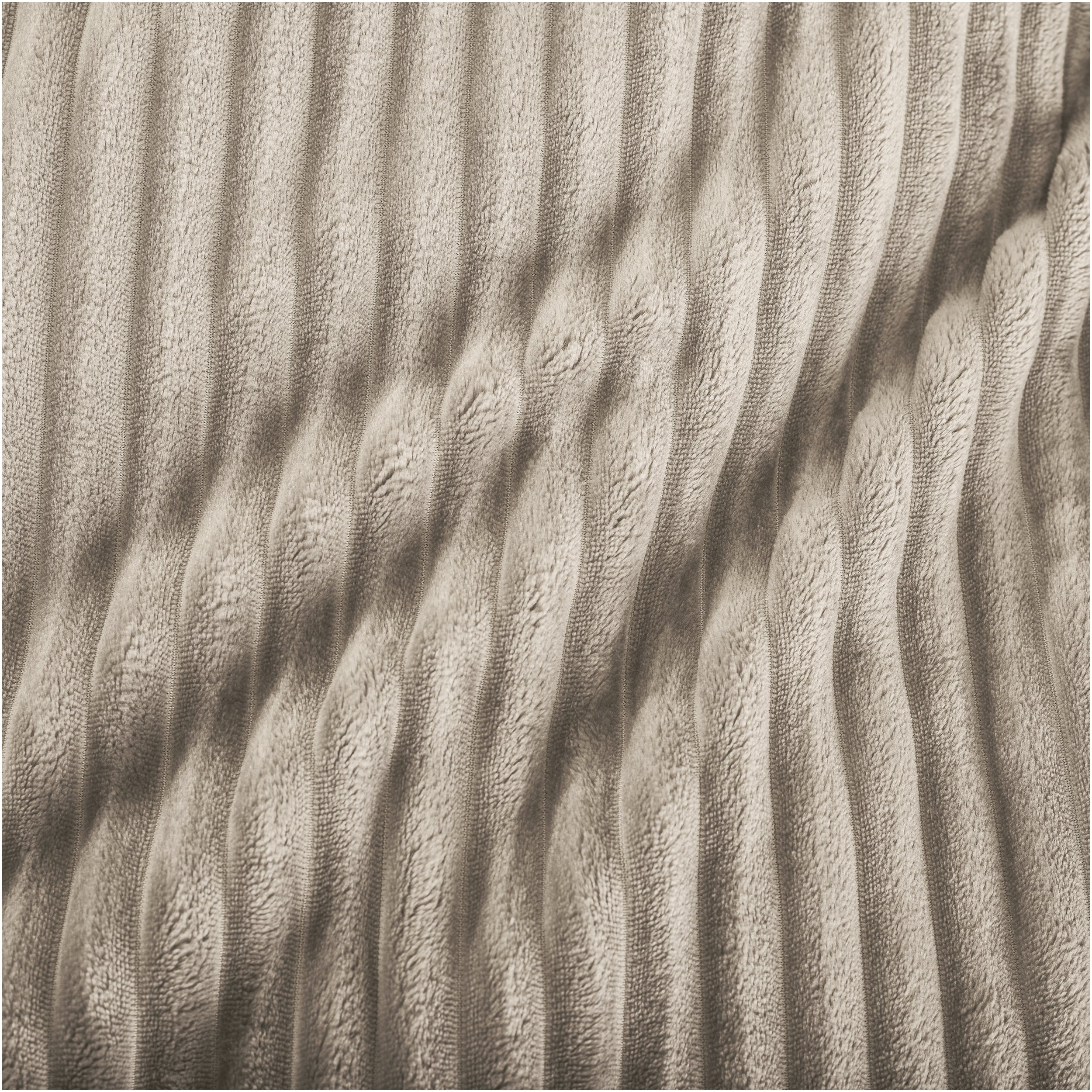 Close up of microplush ribbed textured blanket
