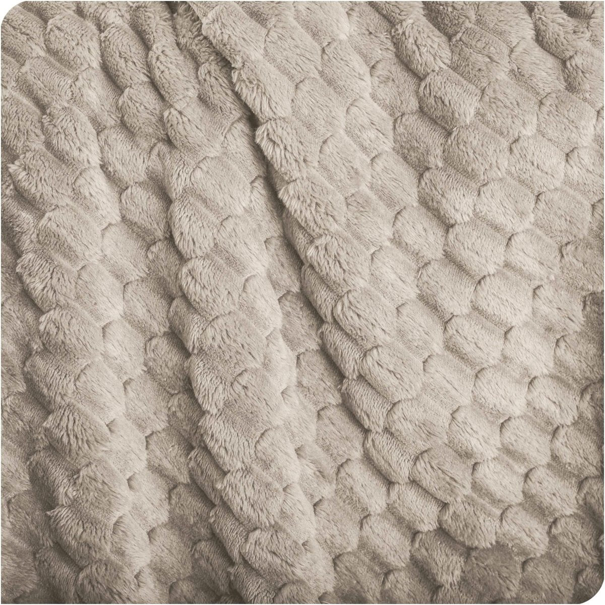 Close up of microplush waffle textured blanket