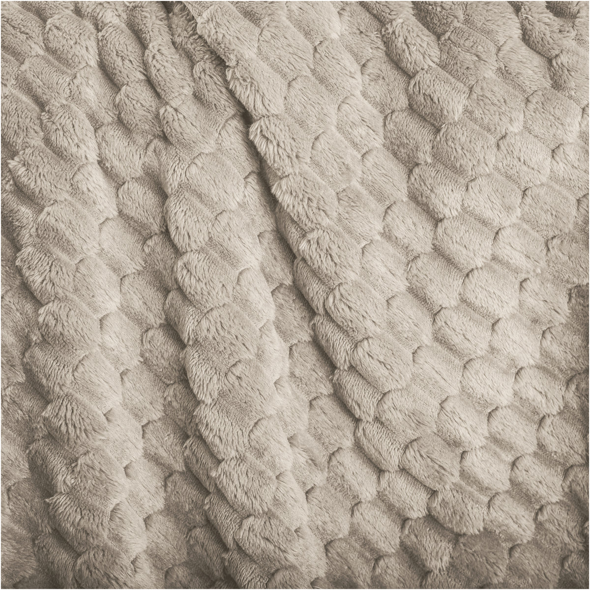 Close up of microplush waffle textured blanket