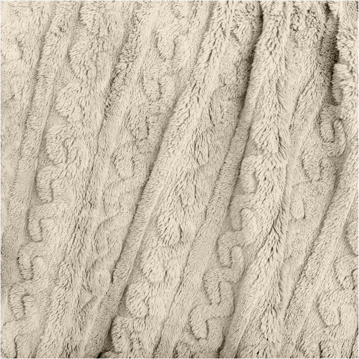 Close up of the textured cable knit blanket