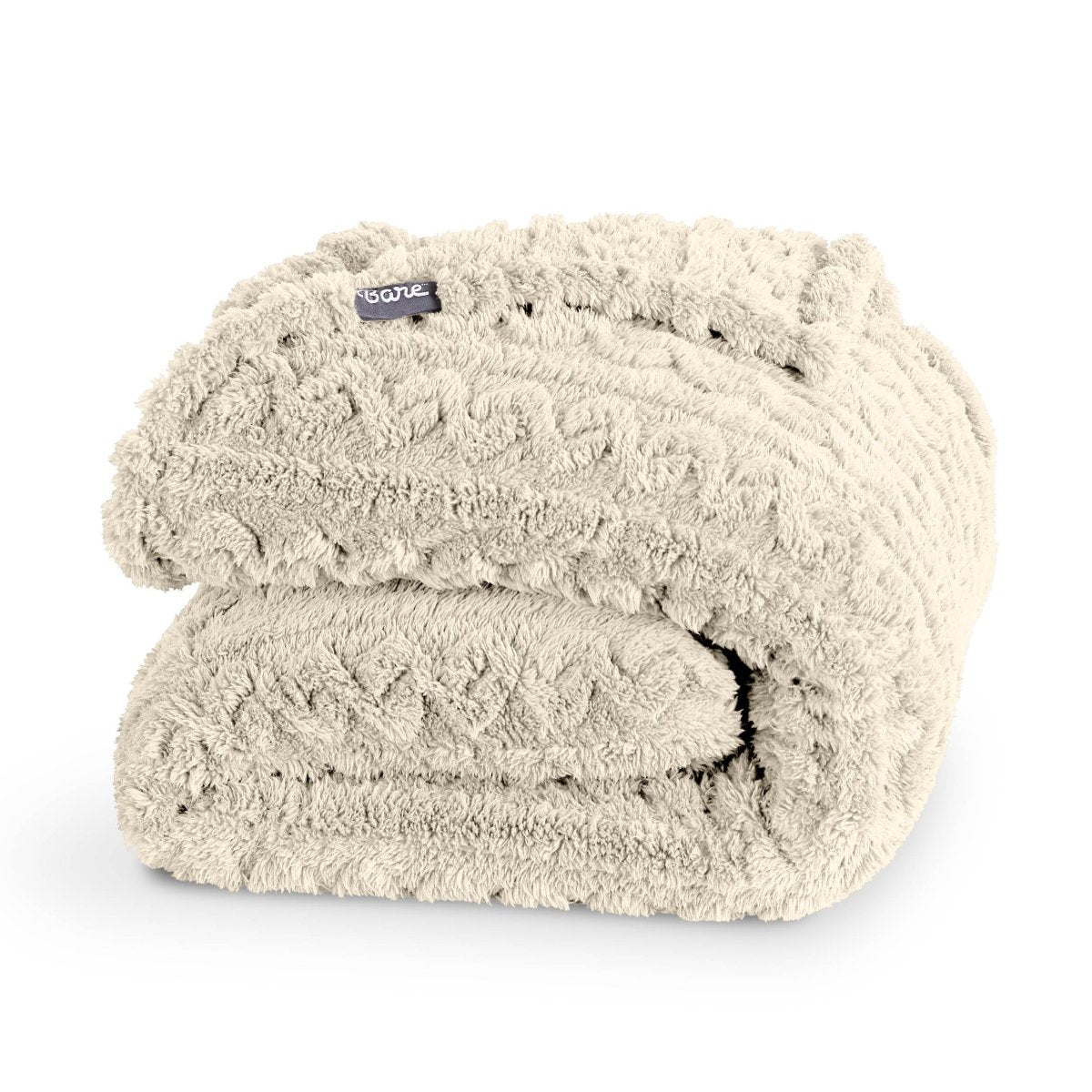 Cable knit faux shearling blanket folded