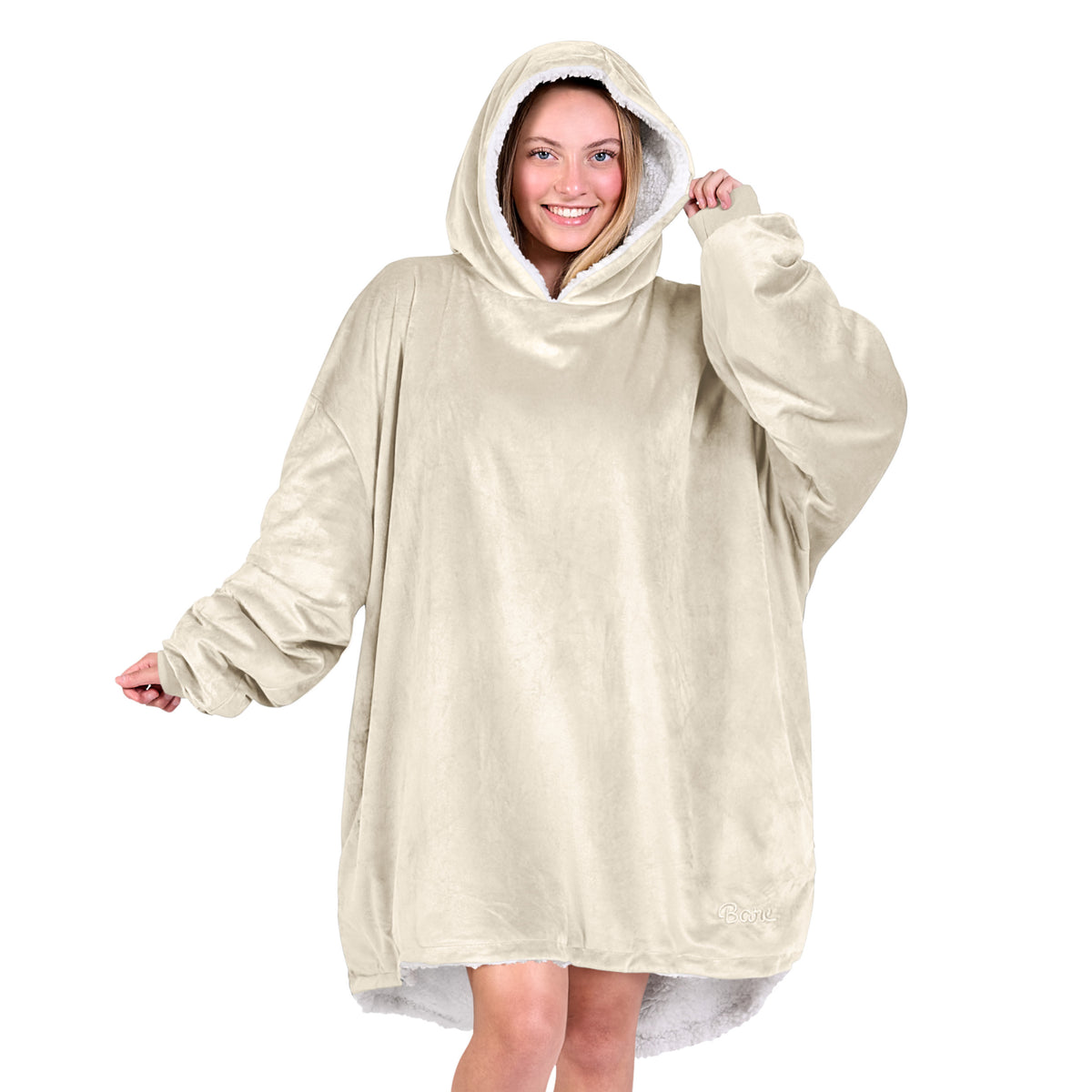 An adult with a sherpa wearable blanket on