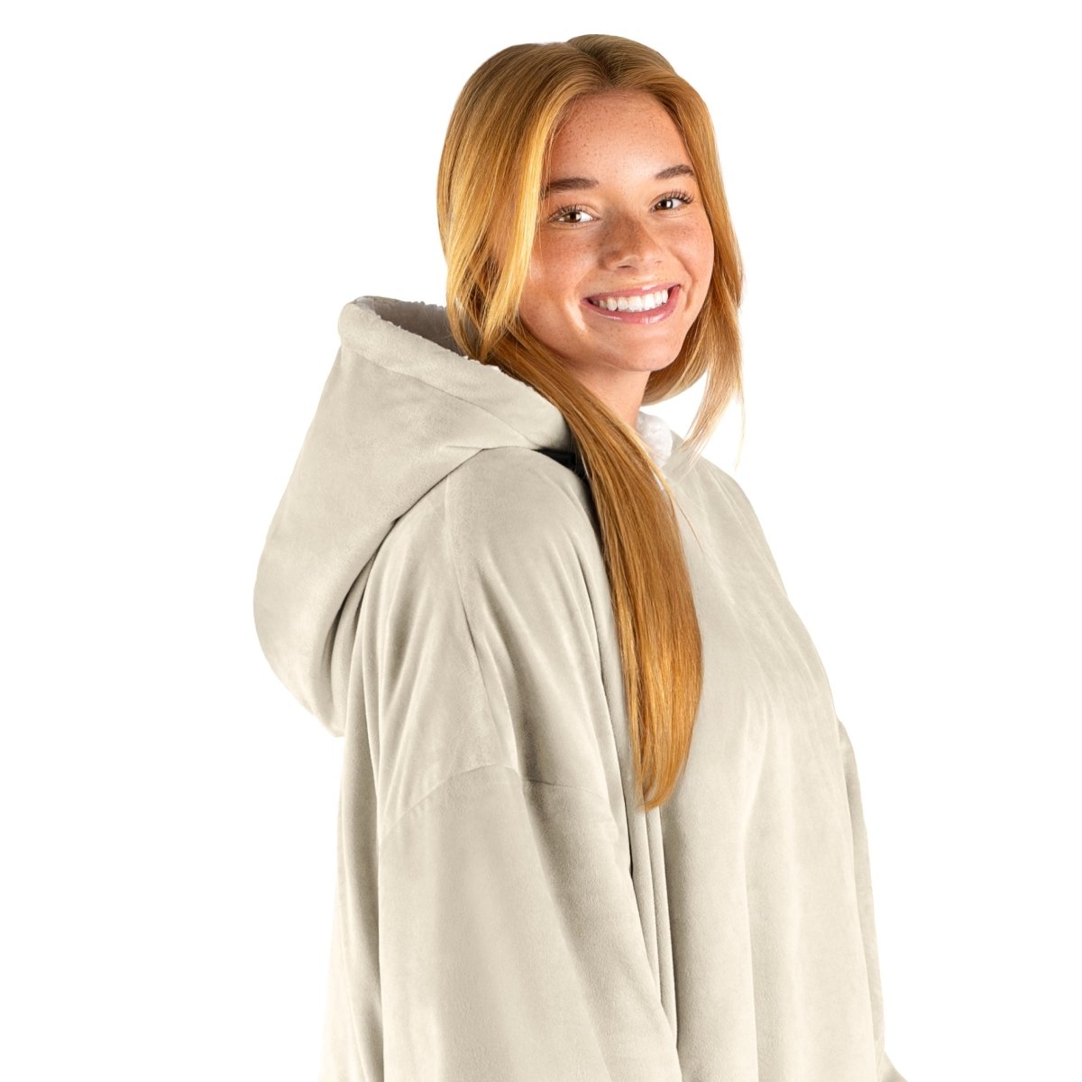 An adult with a hooded wearable blanket on