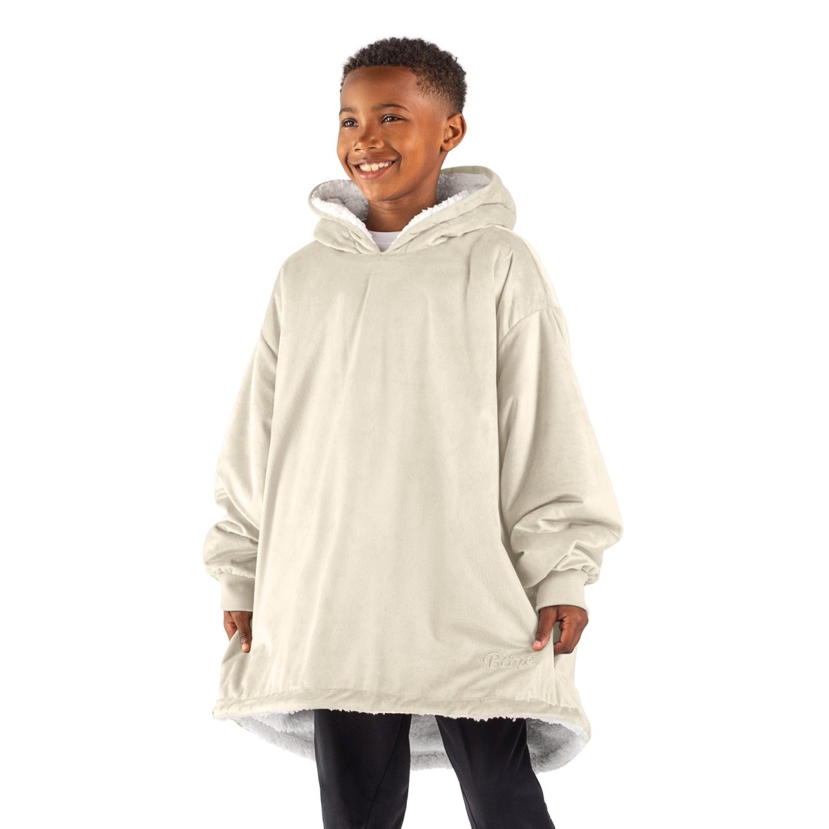 A child with a sherpa wearable blanket on