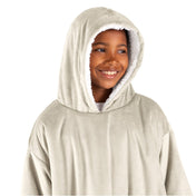 A child with a wearable blanket on