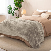 Close up of the soft texture of a shaggy faux fur sherpa blanket