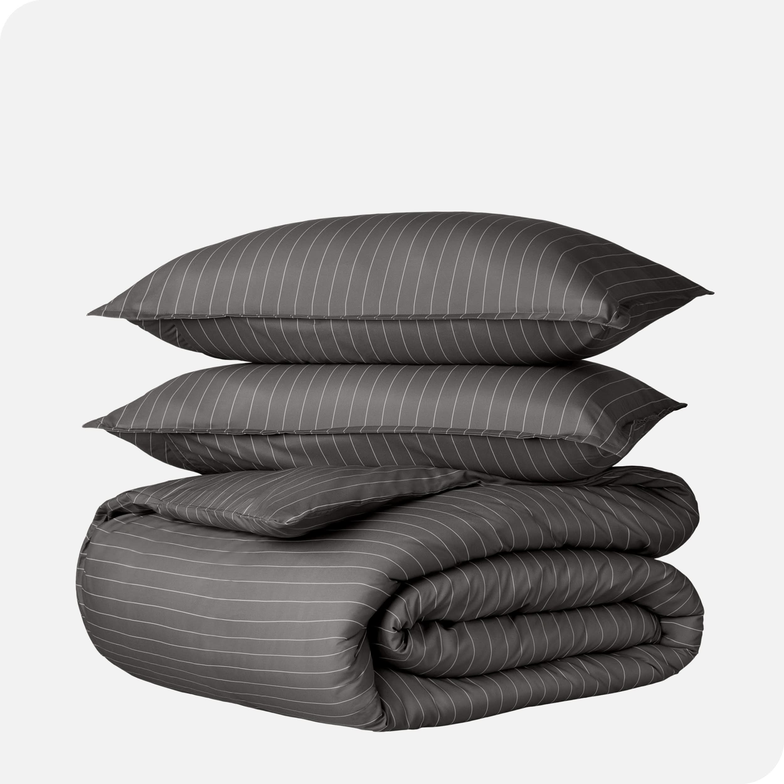 A duvet cover set folded and stacked