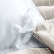 Close up of the ties on a duvet cover