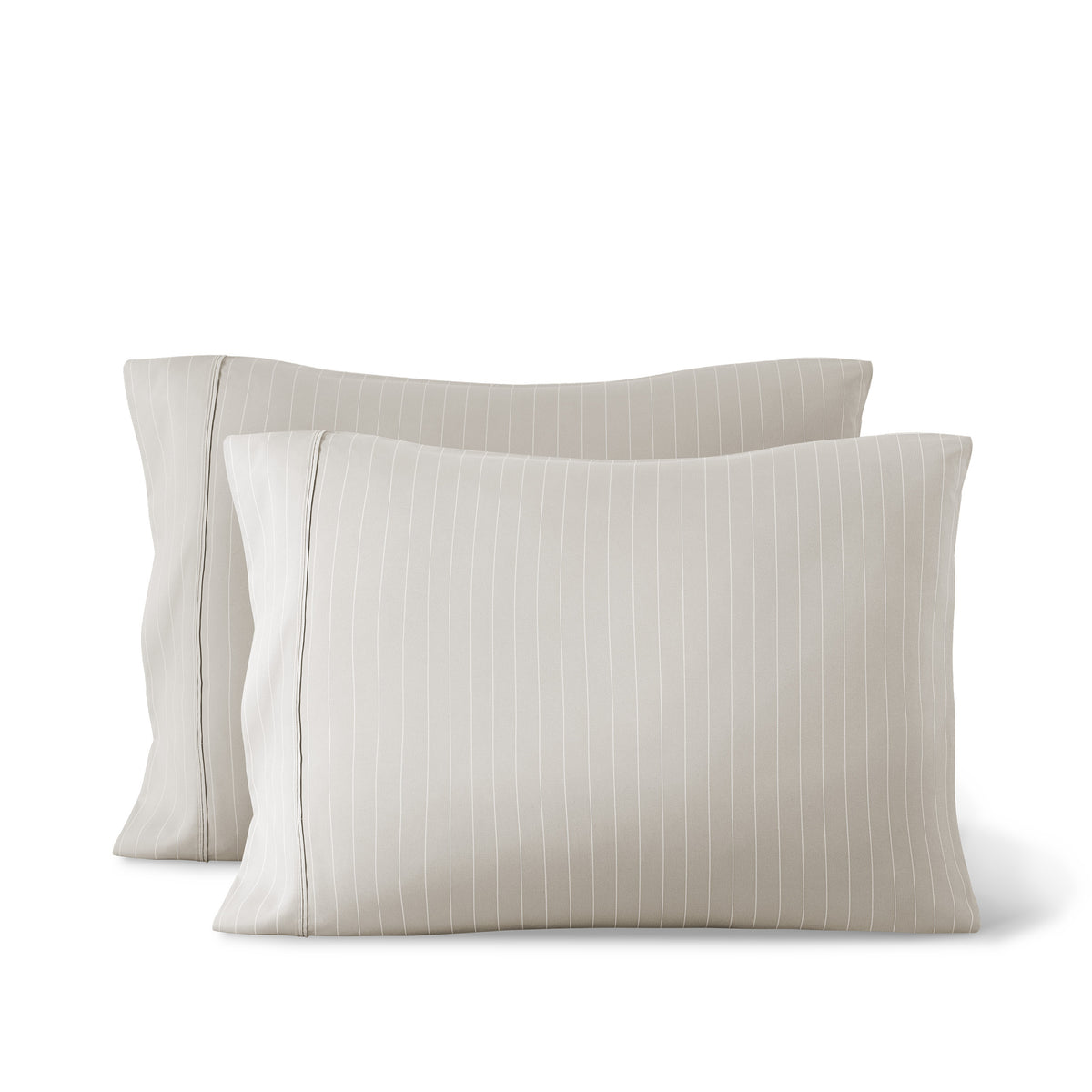 2 printed pillowcases against a white background