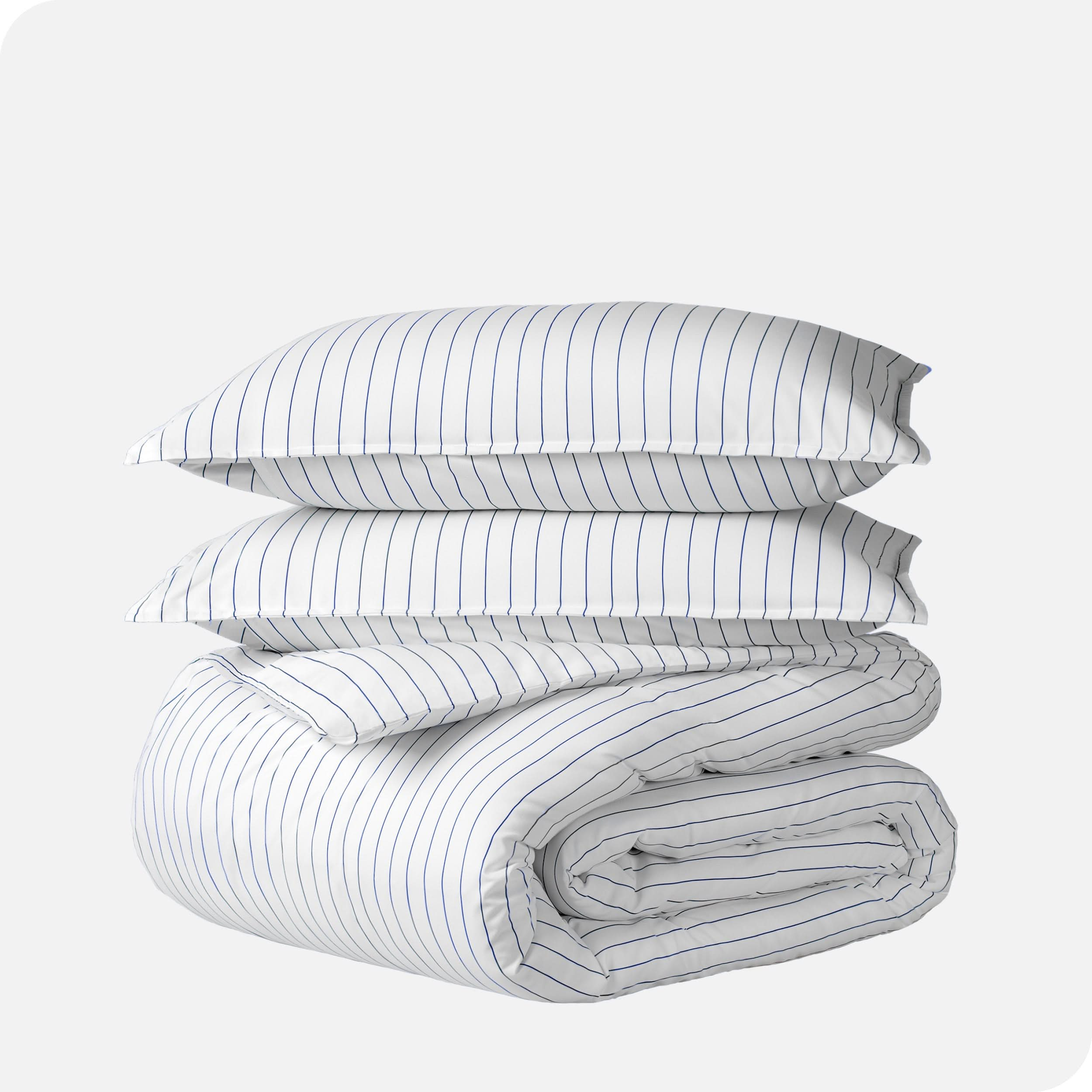 A duvet cover set folded and stacked