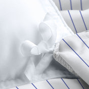 Close-up of a pinstripe duvet cover with corner ties