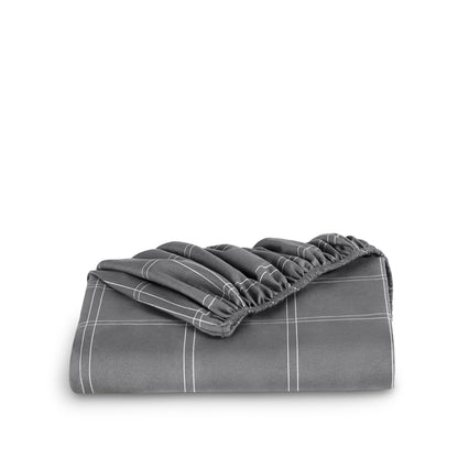 Microfiber fitted sheet folded with a white background