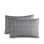 Two printed pillowcases on a white background
