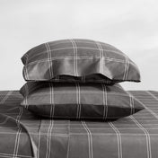 Printed pillowcases stacked