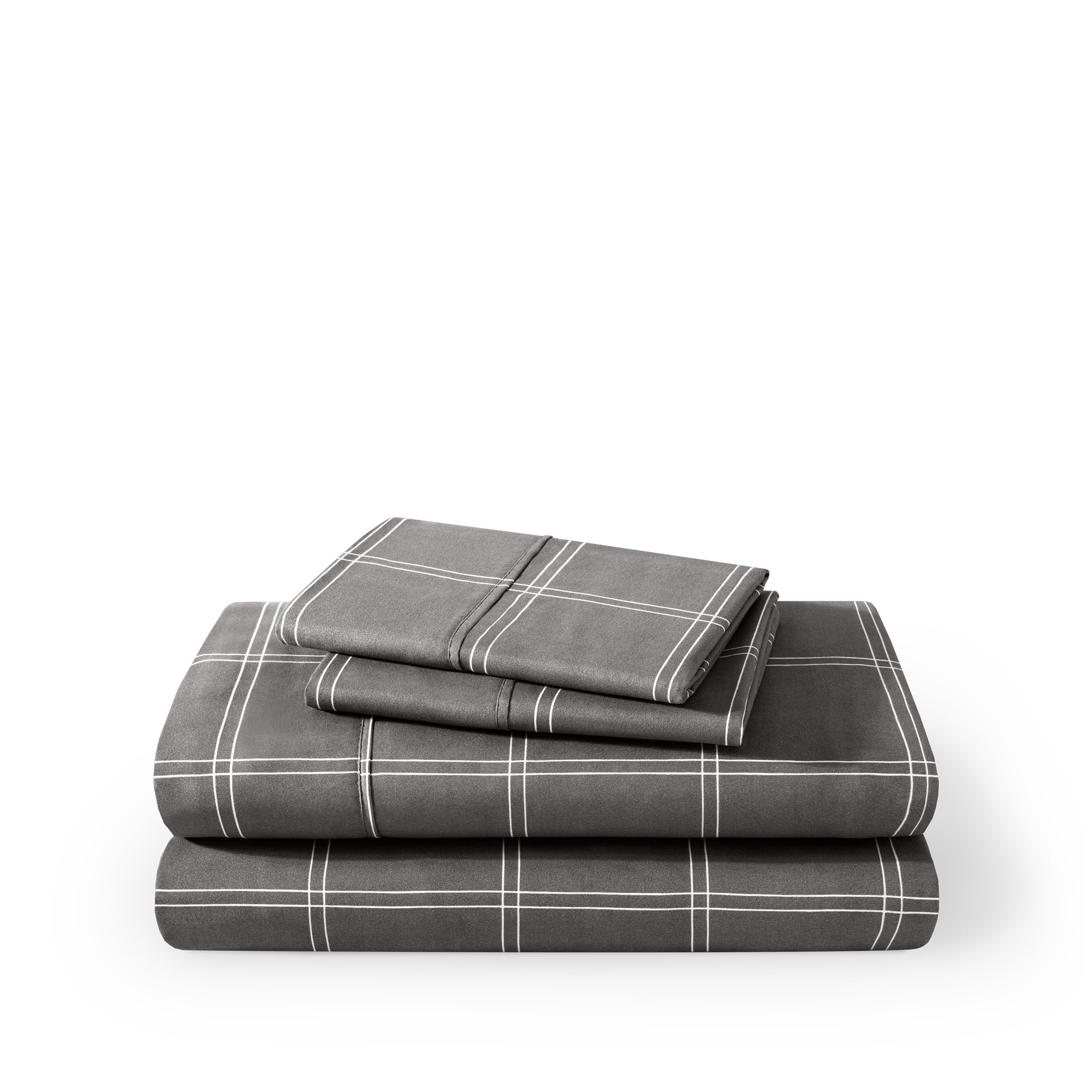 Plaid sheet set folded and stacked