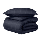 A duvet cover set folded and stacked