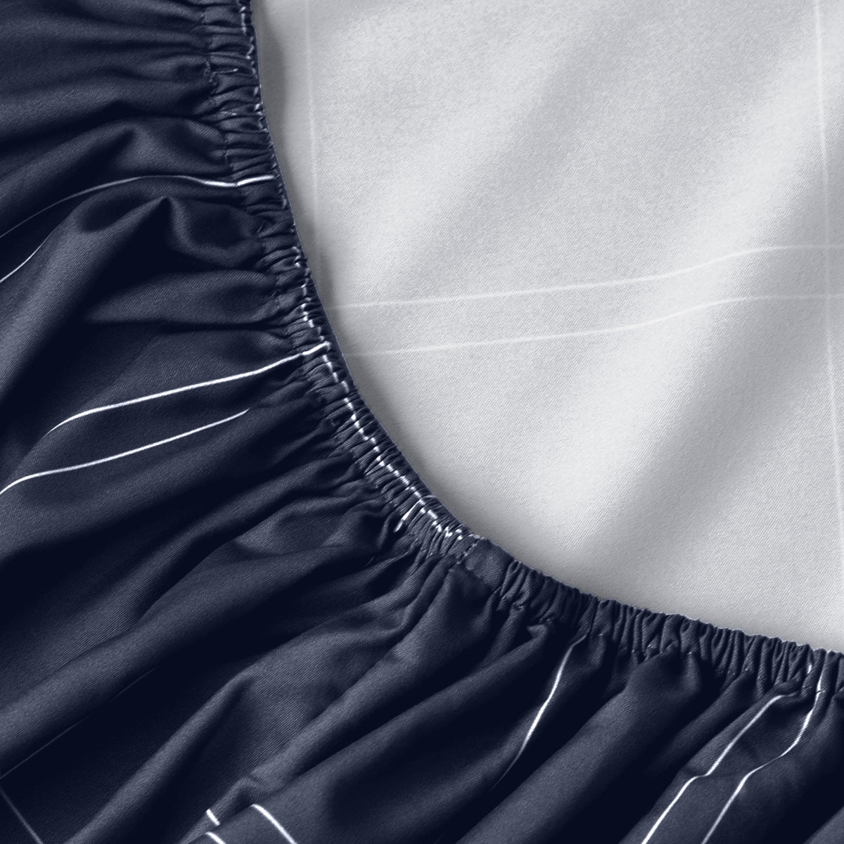 Close-up of fitted sheet with all around elastic