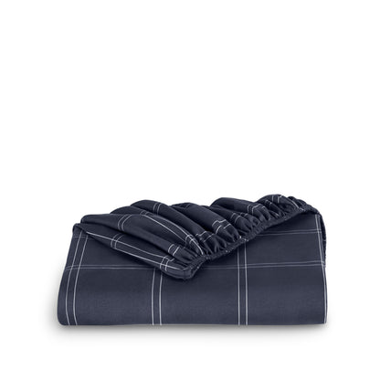 Microfiber fitted sheet folded with a white background