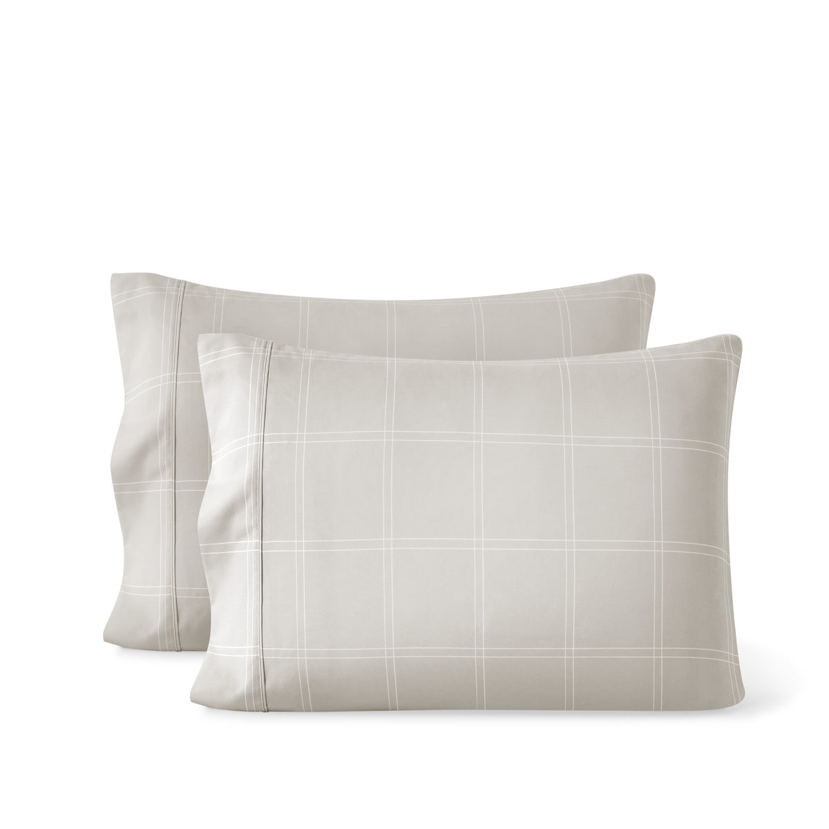 Two printed pillowcases on a white background