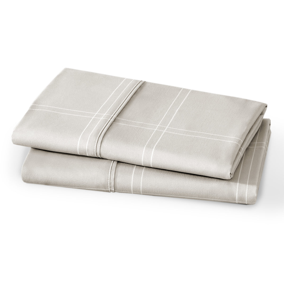 Folded pillowcases on a white background