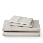 Plaid sheet set folded and stacked
