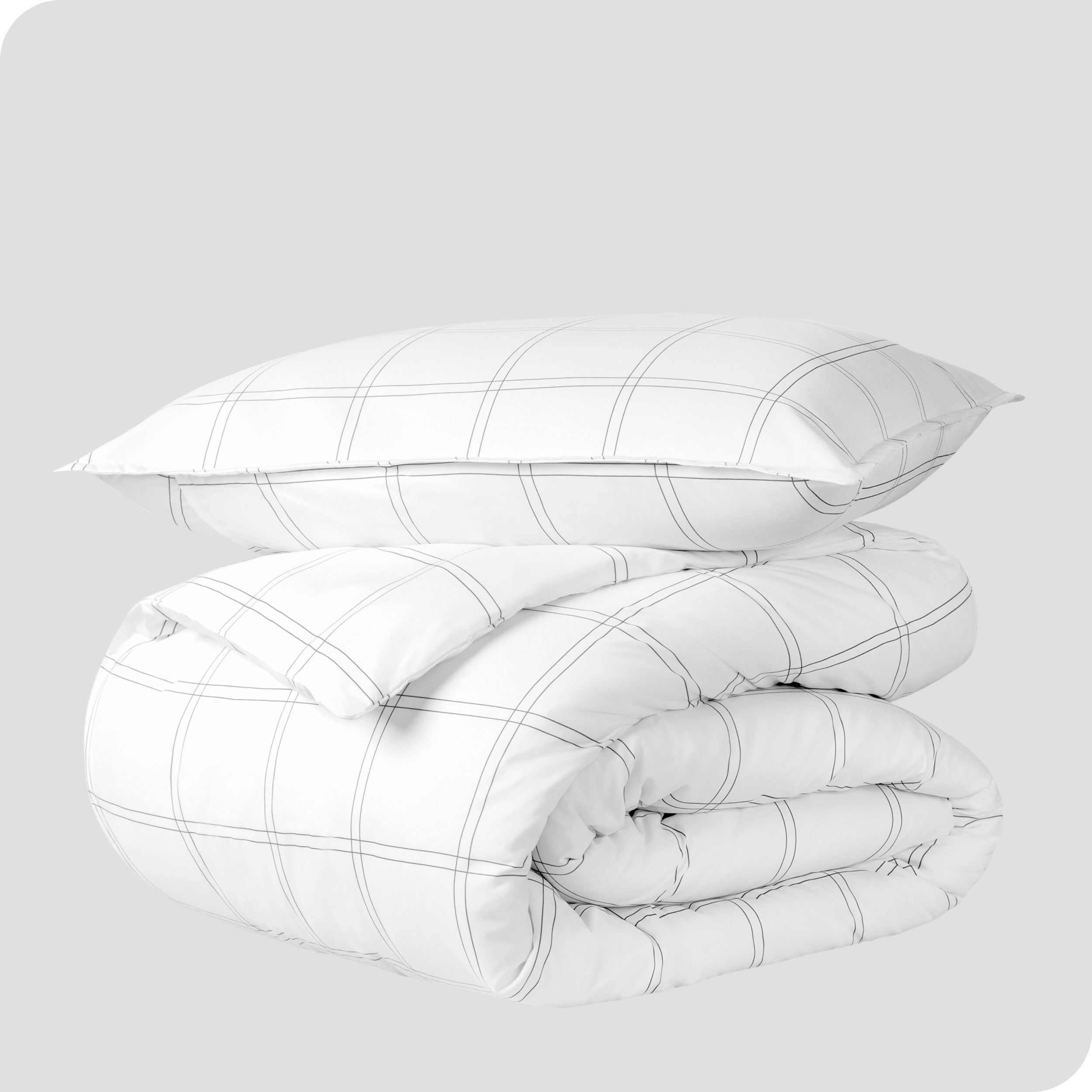 A duvet cover set folded and stacked