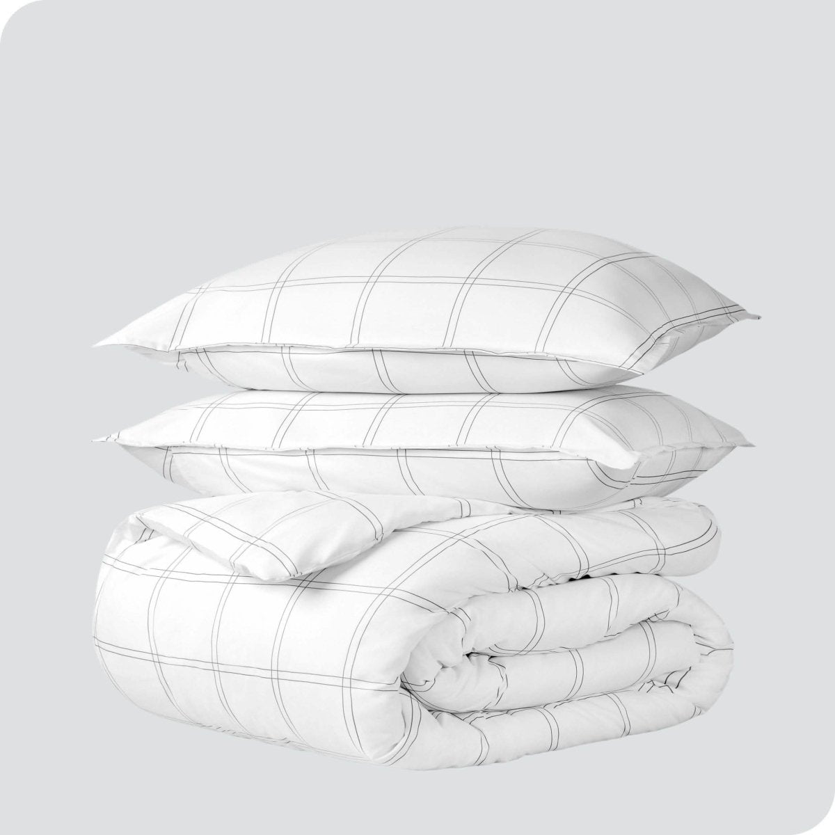 A duvet cover set folded and stacked