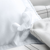 Close up of the ties on a duvet cover