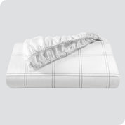 A modern printed fitted sheet folded