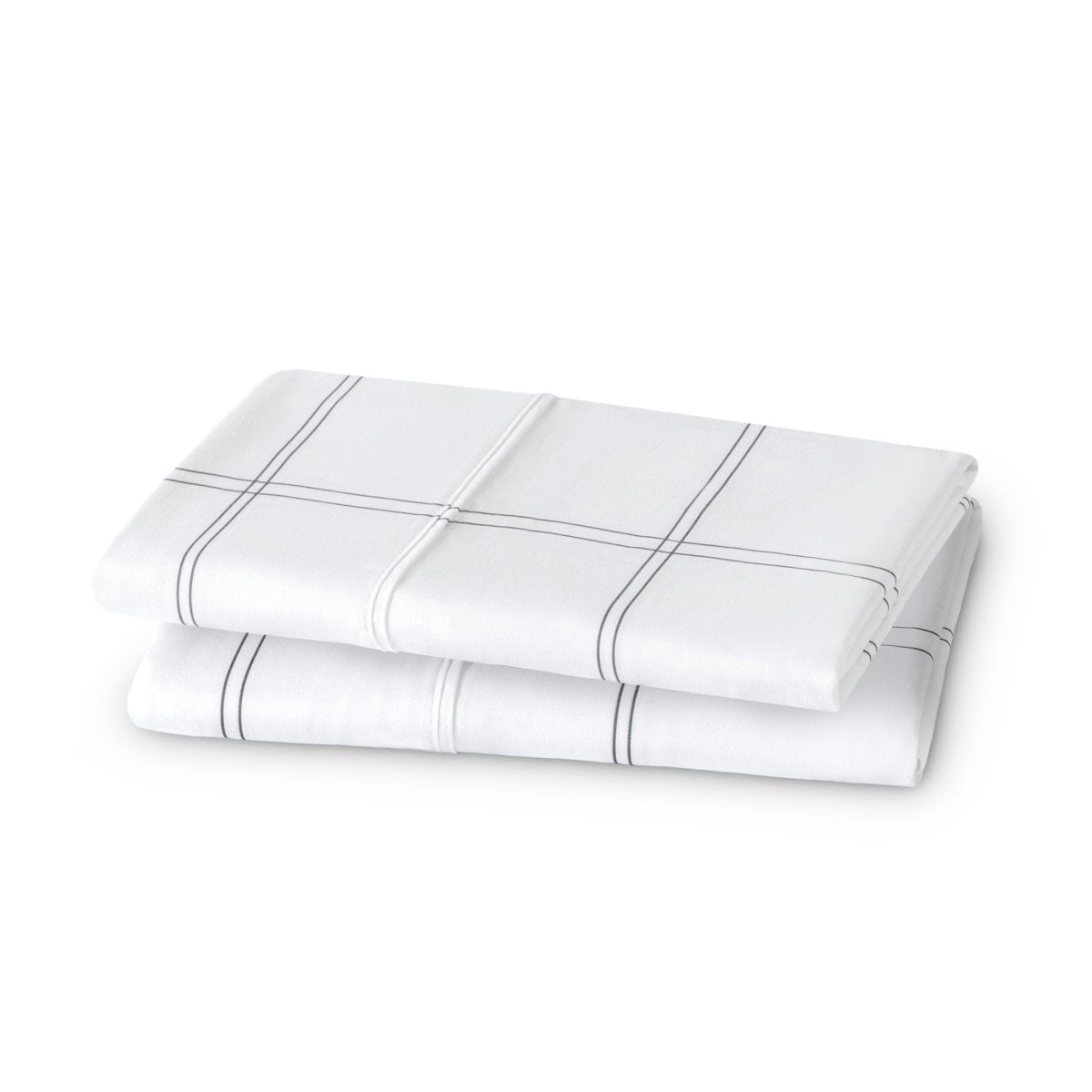 Folded pillowcases on a white background