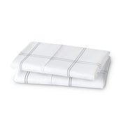 Folded pillowcases on a white background